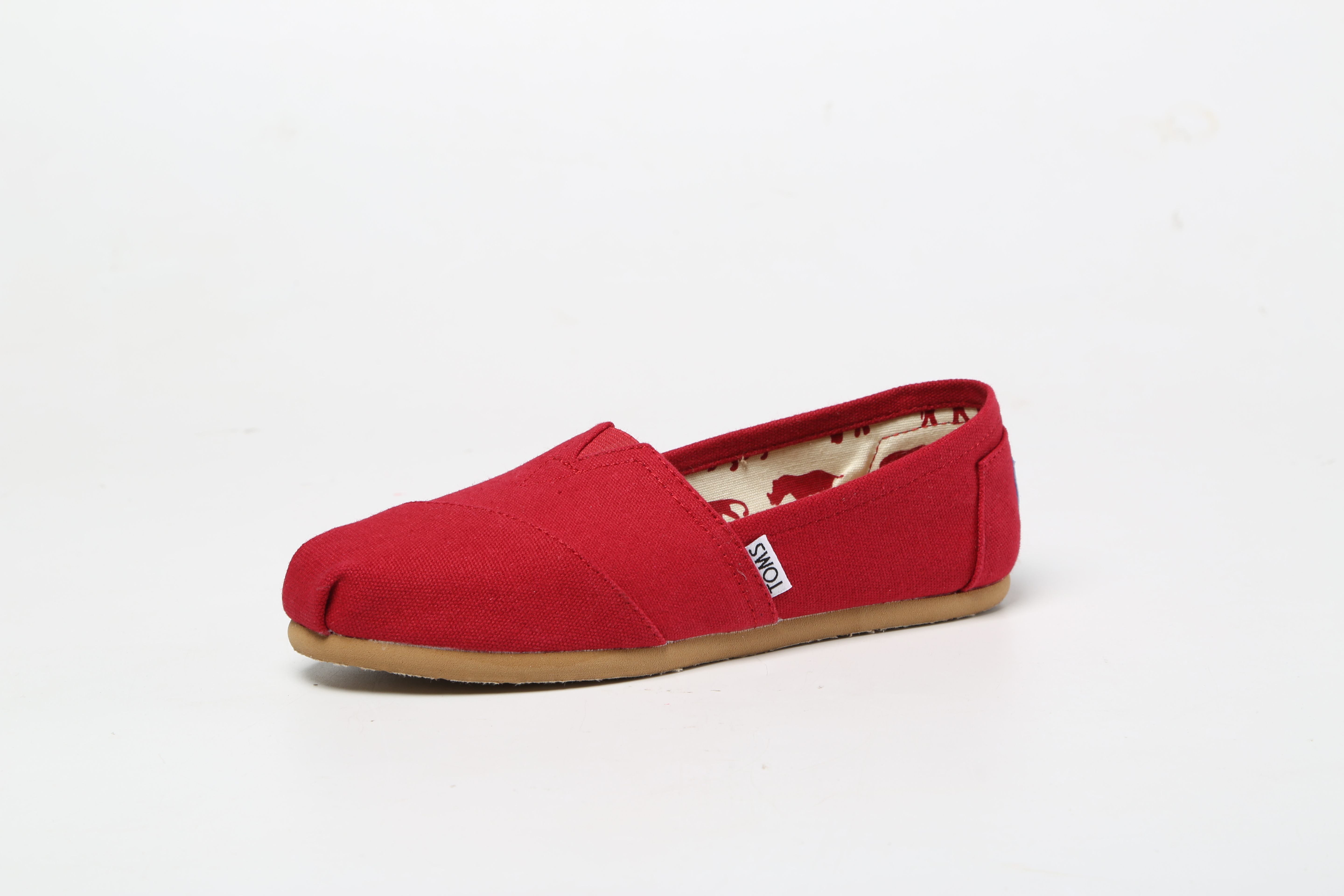 Buy TOMS canvas shoes solid color classic red sleeve feet one foot lazy ...
