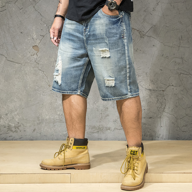 fat man in jean shorts