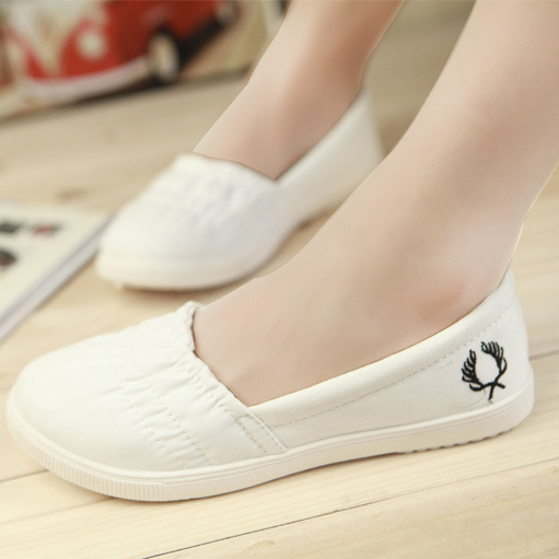 white slip on canvas shoes womens